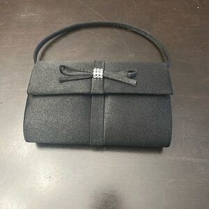 Jessica McClintock Elegant Black Handbag with Bow Accent